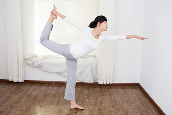 Effortless motion achieved through motion economy wear in yoga pants.